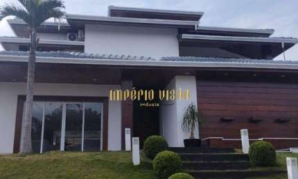 Casa de Alto Padrão com 4 suítes ,closet e hidromassagem à venda no condomínio Novo Horizonte Hills 1 e 2 Arujá.