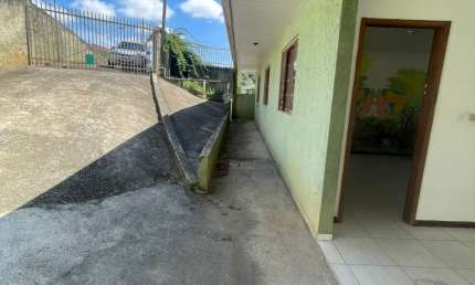 Qualidade de Vida, Natureza e Espaço de Sobra por R$ 382 mil – Terreno com 2 Casas em Campo Magro!