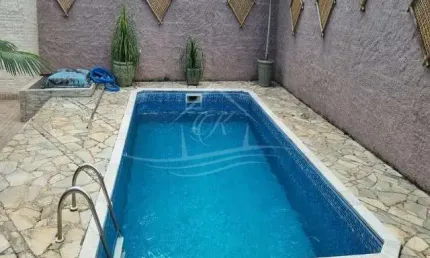 CASA 'A VENDA EM UM TERRENO DE 507 M² COM 03 DORMITÓRIOS (2SUITES) BAIRRO NOBRE SUMARÉ, CARAGUATATUBA/SP