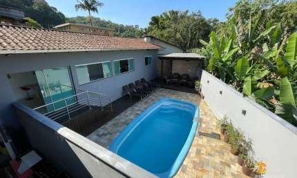 Casa Térrea com Piscina e Área de Festas no Bairro Nova Brasília - Oportunidade Única de Viver com Conforto e Diversão! Venha Conhecer! Opotunidade!