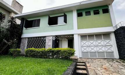 Casa com 5 quartos à venda na Rua Vieira dos Santos, 272, Centro Cívico, Curitiba, 260 m2 por R$ 1.429.900