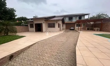 Casa com 4 quartos à venda na Rua Júlia Correia de Barros, 17, Feitoria, São Leopoldo, 430 m2 por R$ 1.400.000
