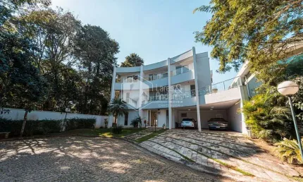 Casa em condomínio para venda com 6 quartos, sendo 4 suítes, 700m²