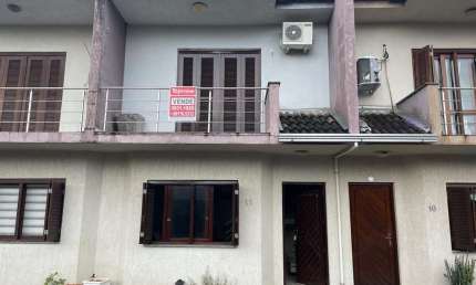 Casa em condomínio fechado com 2 quartos à venda na Rua Atenas, 44, Niterói, Canoas por R$ 380.000