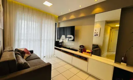Apartamento com 2 quartos (1 suíte), 53m², varanda, sala para 2 ambientes, móveis planejados, cozinha e área de serviço