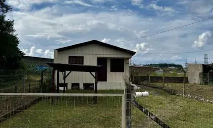 Terreno com chalé em bom estado no Loteamento Arroio Grande