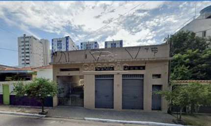 Terreno 10 x 40 - 400m2 com 4 casas e + Salão comercial na frente