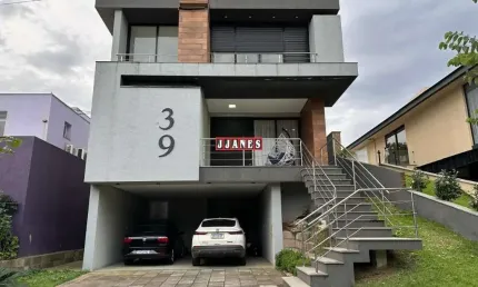 Casa em condomínio fechado com 3 quartos à venda na Tapir Rocha, 8500, Condomínio Buena Vista, Viamão por R$ 1.690.000