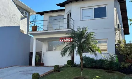 Casa em condomínio fechado com 3 quartos à venda na Tapir Rocha, 8500, Condomínio Buena Vista, Viamão por R$ 899.000
