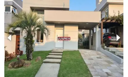 Casa em condomínio fechado com 3 quartos à venda na Rodovia Tapir Rocha, 8500, Condomínio Buena Vista, Viamão por R$ 1.250.000