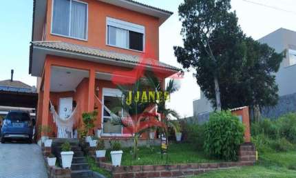 Casa em condomínio fechado com 3 quartos à venda na Tapir Rocha, 8500, 114, Condomínio Buena Vista, Viamão por R$ 1.299.000