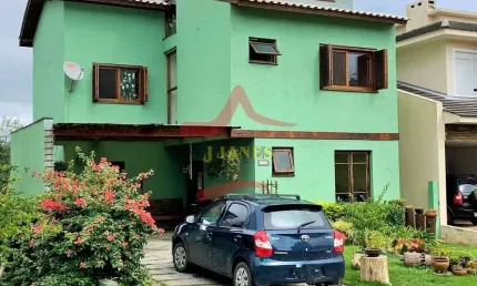 Casa em condomínio fechado com 3 quartos à venda na Tapir Rocha, 8500, Condomínio Buena Vista, Viamão por R$ 900.000