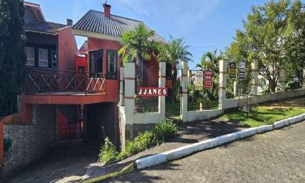 Casa em condomínio fechado com 4 quartos à venda na Rua Peroba, 127, Cantegril, Viamão por R$ 2.100.000