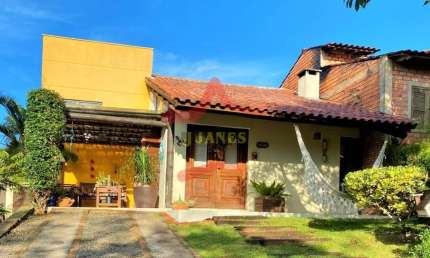 Casa em condomínio fechado com 3 quartos à venda na Rua Pinheiros, 1116, Cantegril, Viamão por R$ 900.000