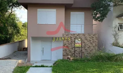 Casa em condomínio fechado com 3 quartos à venda na Tapir Rocha, 8500, Condomínio Buena Vista, Viamão por R$ 980.000