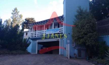 Casa com 4 quartos à venda na Joao Carlos Vialle Dias, 1347, Tarumã, Viamão por R$ 2.490.000