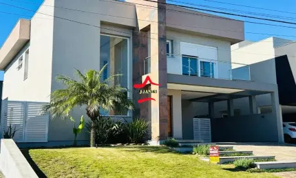 Casa em condomínio fechado com 3 quartos à venda na Tapir Rocha, 8500, Condomínio Buena Vista, Viamão por R$ 1.850.000