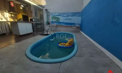 Casa com 3 quartos à venda na Rua Irmão Firmino Biazus, 230, Hípica, Porto Alegre