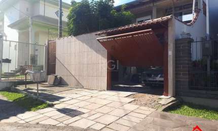 Casa com 3 quartos à venda na Rua José Pereira da Cunha, 49, Vila Nova, Porto Alegre
