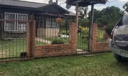 Casa com 2 quartos à venda na Avenida Figueira, 374, Tarumã, Viamão