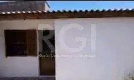 Casa com 3 quartos à venda na Acesso Cinco, 4994, Restinga, Porto Alegre