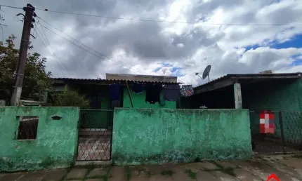 Casa com 3 quartos à venda na Acesso Quatro, 4958, Restinga, Porto Alegre