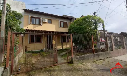 Casa com 4 quartos à venda na Rua Doutor Cláudio Walter Ferreira da Silva, 191, Guarujá, Porto Alegre