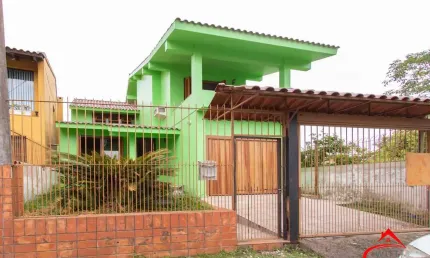 Casa com 3 quartos à venda na Rua Augusto de Lourenço Martins, 110, Vila Nova, Porto Alegre