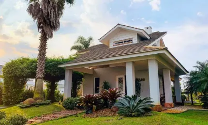 Sobrado à venda, 4 quartos, 4 suítes, 2 vagas, Condomínio Quintas do Lago - Xangri-Lá/RS
