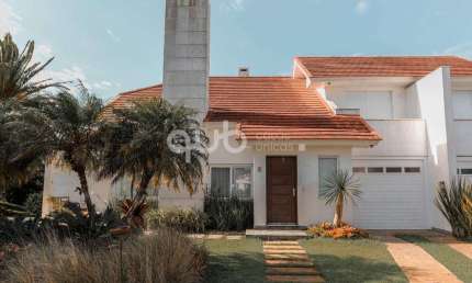 Sobrado à venda, 4 quartos, 4 suítes, 2 vagas, Condomínio Green Village - Xangri-Lá/RS