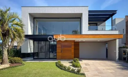 Sobrado à venda, 4 quartos, 4 suítes, 2 vagas, no condomínio enseada lagos, xangri-lá/rs.
