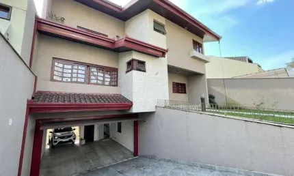Sobrado com 4 dormitórios à venda, 405 m² por R$ 1.900.000,00 - Tarumã - Curitiba/PR