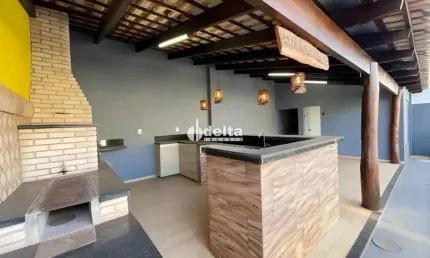 Casa residencial disponível para locação no bairro Santa Mônica em Uberlândia-MG.