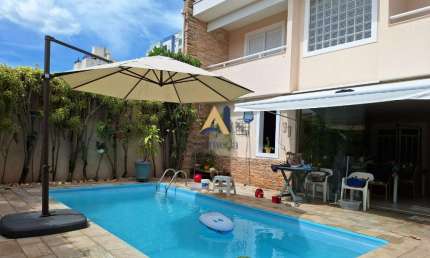 Sobrado para venda no bairro Parque das Flores, com 4 suítes, piscina e 4 vagas