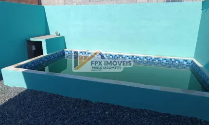 casa na praia com piscina em Itanhaém por R$ 220.000,00