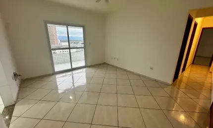 Apartamento 02 dormitórios, 01 suíte, com 86m de área útil, sacada gourmet com vista livre em andar alto para locação na Vila Guilhermina em Praia Grande-SP