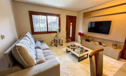 Casa com 3 quartos à venda na Travessa Borneo, 32, Jardim Lindóia, Porto Alegre por R$ 1.180.000