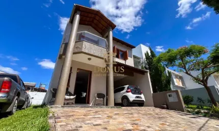 Casa em condomínio fechado com 3 quartos à venda na Rua Deputado Hugo Mardini, 1780, Passo das Pedras, Porto Alegre por R$ 680.000