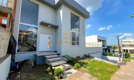 Casa em condomínio fechado com 3 quartos à venda na Rua Antonio Lory Müller, 200, Mário Quintana, Porto Alegre por R$ 1.399.000