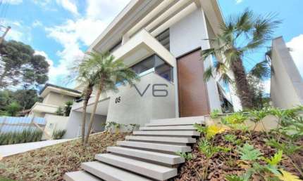 Casa alto padrão com 4 suítes, 531m² privativos, 6 vagas de garagem, em São Braz - PR.