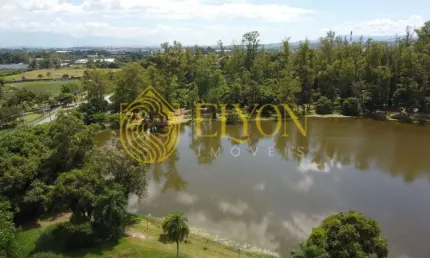 Terreno em condomínio em internacional parque, guaratinguetá/sp