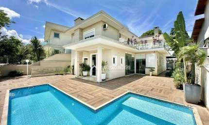 Casa com 4 dormitórios, 359 m² - venda por R$ 2.800.000 ou aluguel por R$ 18.000/mês - Golf Park - Carapicuíba/SP