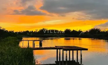 Casa beira da lagoa com trapiche na Ferrugem – 3 dormitórios