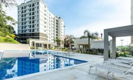 Apartamento semimobiliado com 2 vagas de garagem no bairro Costa e Silva.