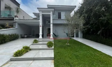 Casa com 4 suítes à venda, 240 m² por R$ 5.000.000 - Riviera Módulo 26 - Bertioga/SP