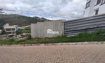 Terreno com 423,48 metros quadrados em condomínio fechado a venda no bairro salvaterra em juiz de fora