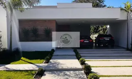 Residência seminova com 285,00 m² construídos, uma suíte e mais dois dormitórios, terreno de 700,00 m², aceita troca