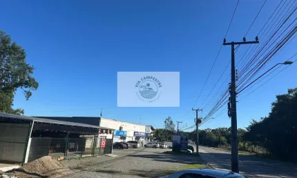 Galpões industriais com 2.032 m² construidos, num terreno de 18.011 m², frente para o asfalto, analisa permuta parcial