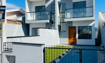 Casa tipo sobrado a venda sendo 02 suítes no loteamento jardins ii em palhoça-sc