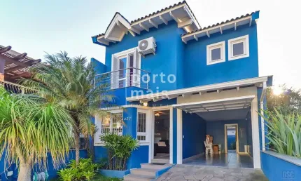 Casa em condomínio fechado com 3 quartos à venda na Rua Pau Brasil, 437, Hípica, Porto Alegre por R$ 660.000